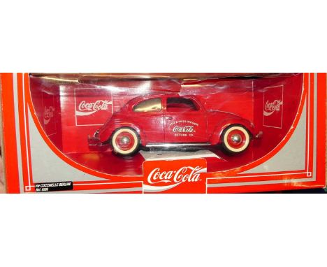 A Solido Coca-Cola release model No.9506 of a Coca-Cola VW Beetle, housed in the original window box 