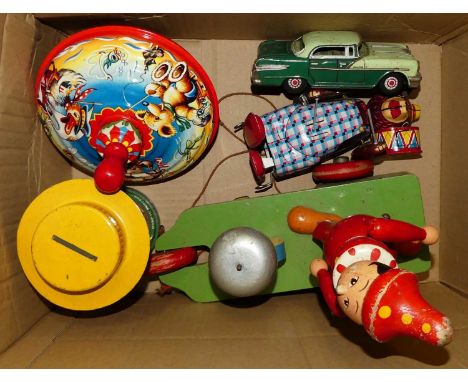 One box containing a quantity of childrens tinplate and wooden toys, to include a West German child's possibly Technofix spin