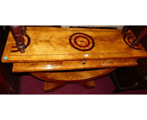 A contemporary maple veneered console table, having single frieze drawer and raised on curved base, width 121cm