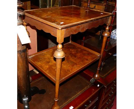 A 1930s figured walnut two-tier tea trolley, raised on roller castors, w.61cm; together with a 19th century rosewood(?) pedes