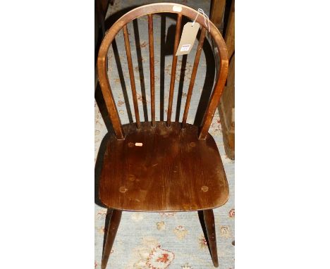 A set of four Ercol mid-elm stickback kitchen chairs, together with a further Ercol light elm stickback kitchen chair (5)