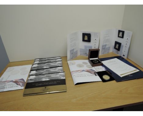 A collection of London Mint Gold Layered Coins, 2010 Sir Douglas Bader 70th Anniversary, 1967 Portcullis Threepence x2, 1967 