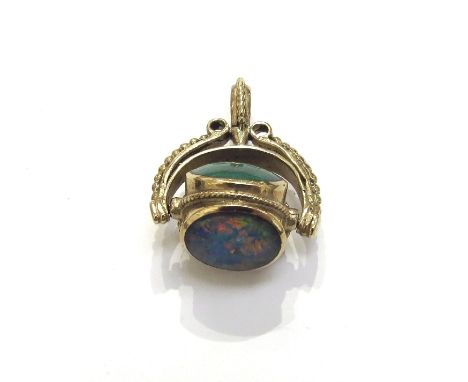 A 9ct gold three sided swivel fob, opal, cornelian and malachite, 7.9g