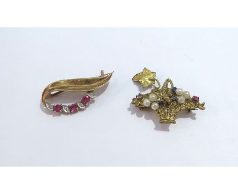 A 9ct gold ruby and diamond brooch, 2.5g and a costume brooch