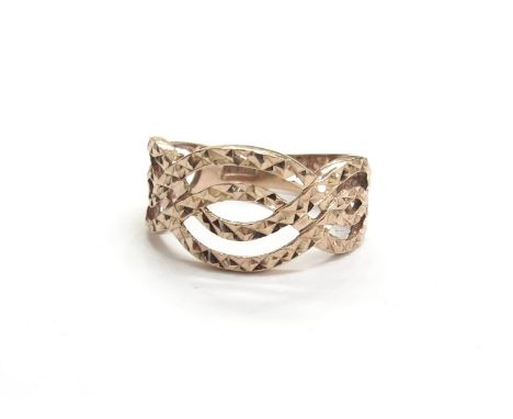 A 9ct rose gold wavy band with bright cut detail. Size K, 2g