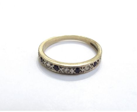 A 9ct gold sapphire and clear stone half hoop ring. Size K, 1.4g
