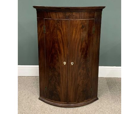 ANTIQUE MAHOGANY BOWFRONTED WALL HANGING CORNER CUPBOARD, 108cms H, 75cms W, 53cms D Provenance: private collection Gwynedd(G