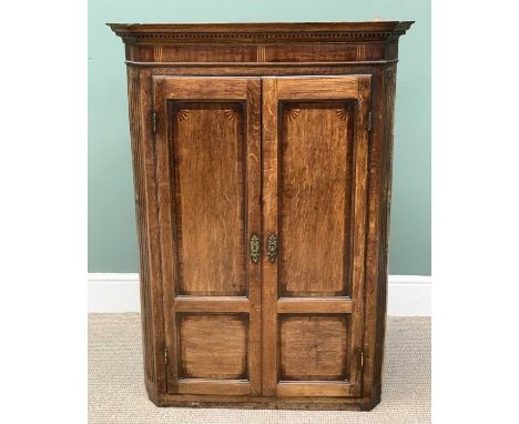 ANTIQUE OAK &amp; MAHOGANY HANGING CORNER CUPBOARD, two doors, having crossbanded and fan inlays to the twin panel doors, and