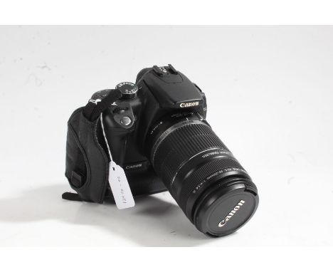 Canon EOS 350D camera with Canon EFS 55-250mm 1.1m/3.6ft 1:4-5.6 IS lens and battery grip