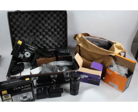 Camera accessories to include battery grips, Canon 200mm lens, Yongniu flash, camera bag, camera case etc. (qty)