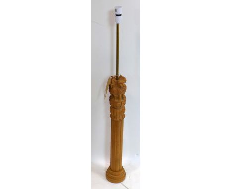 An Indian carved walnut lamp depicting the lion capital of Ashoka, H.68cm 