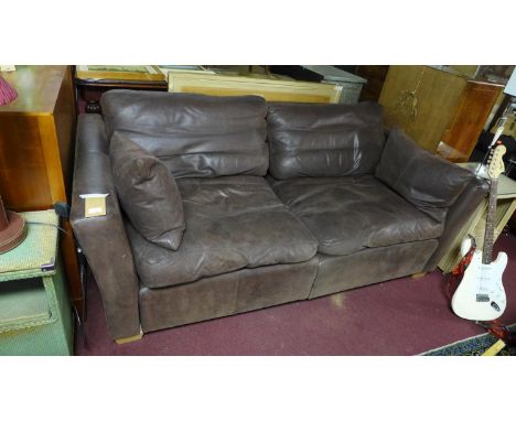 A brown leather sofa 