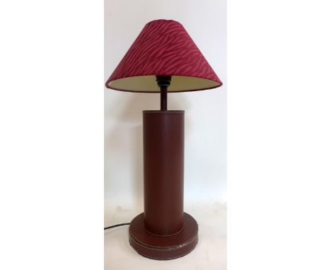 A leather clad table lamp with shade, H.54cm 