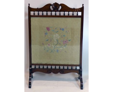 A late 19th century mahogany fire screen with embroidered panel, H.102 W.66 D.28cm 