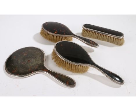 George V silver and tortoise shell dressing table set, Birmingham 1920, makers Mappin &amp; Webb, comprising hand mirror, two