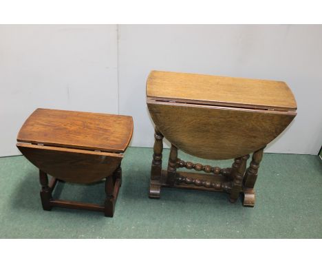 Oak drop leaf table on turned supports, 66cm wide, low oak drop leaf table on turned supports, 51cm wide