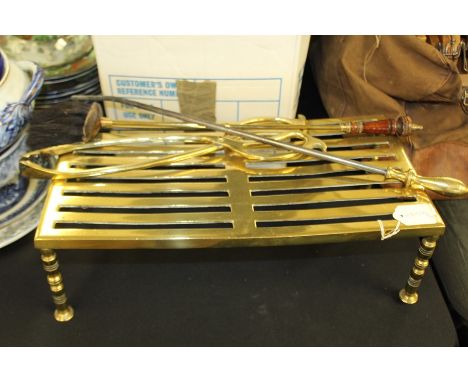 19th Century fire poker, trivet stand, a brush and a pair of brass tongs, (4)