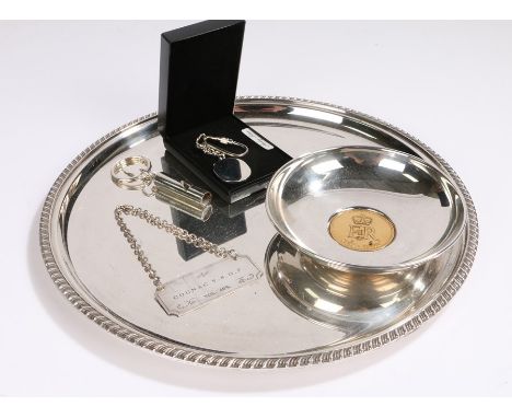 Plated charger with gadrooned border, Elizabeth II Golden Jubilee dish, Cognac V.S.O.P. decanter label, white metal whistle k