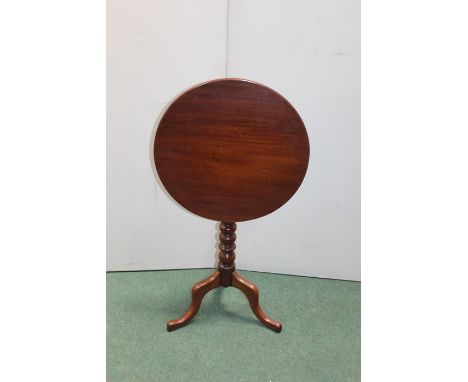 Victorian mahogany tilt top occasional table, the circular top raised on a bobbin turned stem, tripod legs and pad feet, 49cm