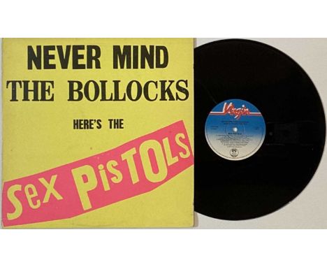 SEX PISTOLS - NEVER MIND THE BOLLOCKS SPOTS LP (A3/ B1 INC POSTER &amp; 7" - SPOTS001). Here we have a beautiful SPOTS issued