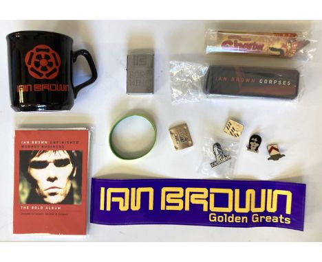 Ian Brown memorabilia: two t-shirts (black size L, brown is M), a 'Corpses' harmonica in case, 'Born Wina' lighter, sherbert 