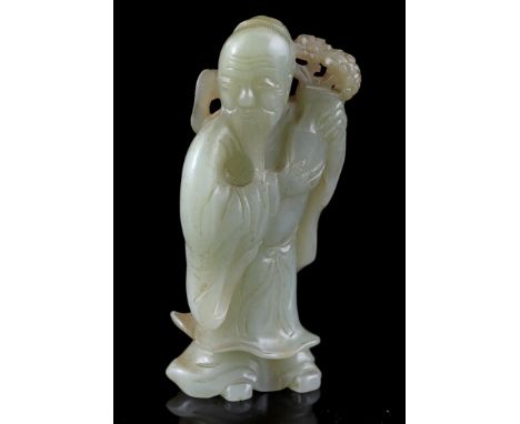 Jade sculpture of a philosopher with flower vase, China 19th century, 10 cm high