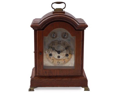 Table clock in an oak case, ca. 1900, 42 cm high