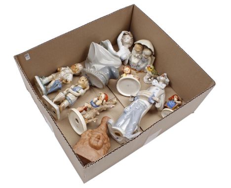 Box with porcelain and earthenware statues including Goebel Hummel, Nao, Casades and earthenware jug