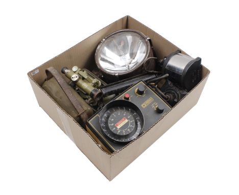 Box of various devices including ship's lamp and theodolite