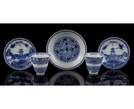 Porcelain contoured saucer with blue floral decor, marked, China Kangxi period ca. 1700, 16.5 cm diameter (chips), 2 porcelai