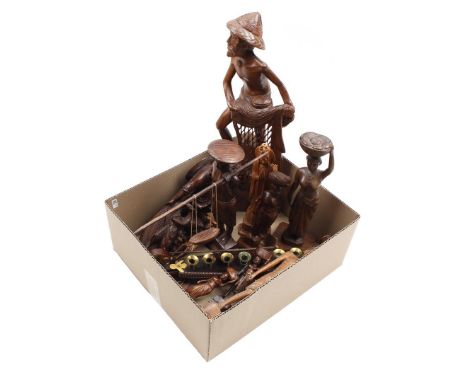 Box with Asian wooden statues and boat-shaped wooden 7-light table candlestick