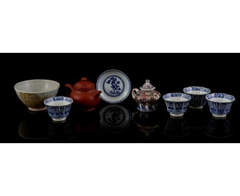 4 porcelain cups with blue floral decor, Kangxi marked, China 19th century, Yixing earthenware teapot, China 20th century, ea