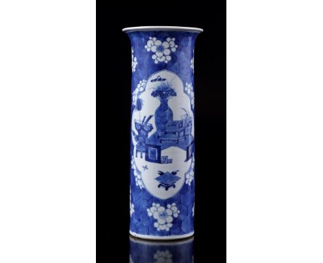 Porcelain rolling vase with 'cracked ice' blue prunus decor and various antiques displayed in 2 cartouches, Kangxi marked, Ch