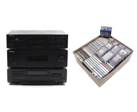Pioneer Stereo receiver SX-20 amplifier, Philips DigitalCompact Cassette player DCC 600, Philips 900 series CDC 935 and CDs a