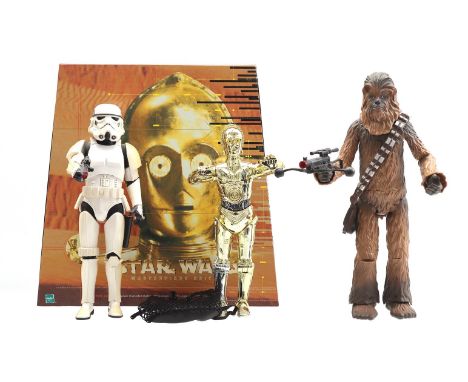 Star Wars Scale 1:6 (approx. 30 cm.) figures - Chewbacca – Disney Store London, 2014. With various battery-related functions.