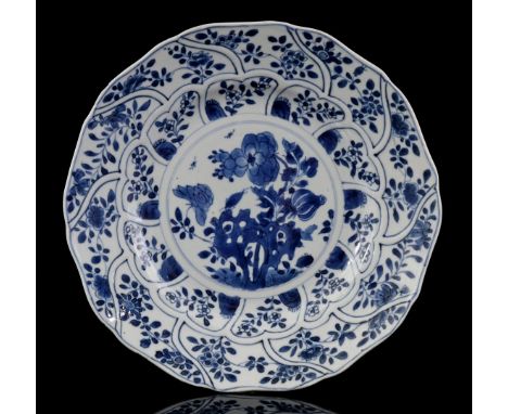 Porcelain contoured dish with blue floral decor in divisions, China Kangxi period ca. 1700, 28 cm diameter (chips and hairlin