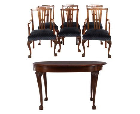 Walnut veneer Chippendale dining area consisting of an oval table, standing on claw feet, 76 cm high, top 128x100 cm, with a 