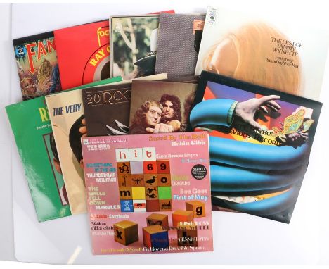 11 x Mixed LPs. To include, Bob Dylan - Desire. Elton John - Captain Fantastic, with poster and booklet. Monty Python - Monty