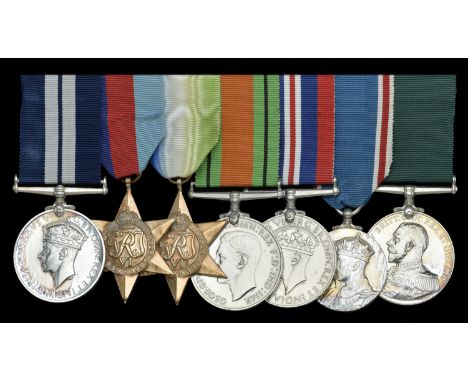 A scarce Second War ‘1941’ D.S.M. group of seven awarded to Leading Stoker H. A. Holland, Royal Naval Reserve, for services w