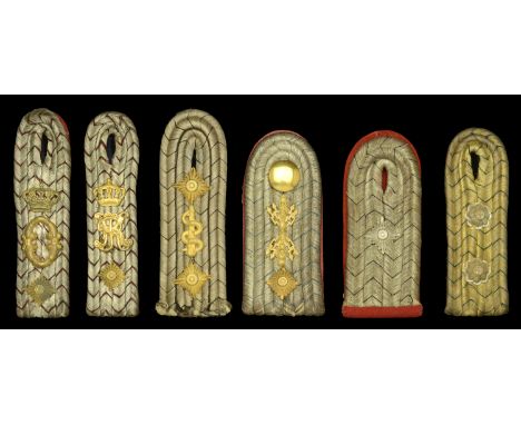Imperial German Officers Shoulder Boards. 6 examples, comprising Prussian Oberleutnant slip-on with red base. Prussian Medica