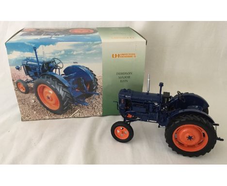 A boxed Universal Hobbies 1:16 scale Fordson E27N tractor.  