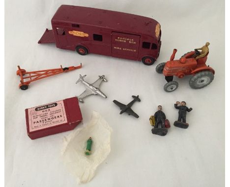 A collection of vintage Dinky vehicles and figures. Comprising boxed OO gauge railway passengers #053, Field Marshall Tractor