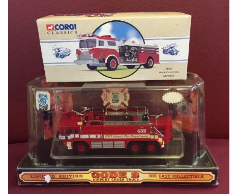 A boxed Oshkosh limited edition code 3 Airport crash truck. Together with a Corgi Mack CF Pumper Neptune Fire engine. 