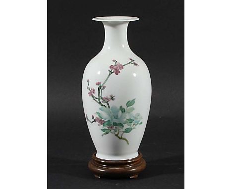 CHINESE FAMILLE ROSE VASE, of shouldered baluster form, painted with prunus and hibiscus flowers on a fine white porcelain  b