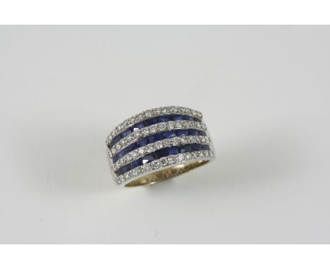 A SAPPHIRE AND DIAMOND HALF HOOP RING formed with alternate rows of circular-cut diamonds and rectangular faceted sapphires, 