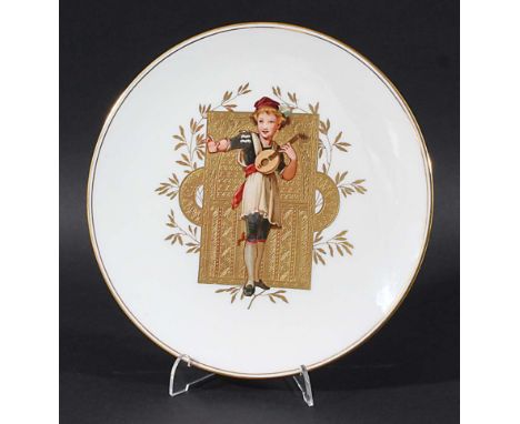 WEDGWOOD CABINET PLATE, circa 1880, painted with a boy playing the mandolin on a tooled gilt aesthetic style ground, iron red