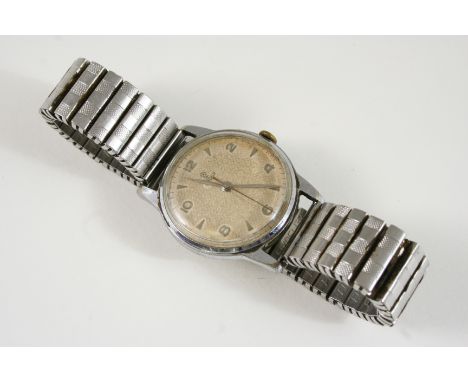 A STAINLESS STEEL WRISTWATCH BY TUDOR ROLEX the signed circular dial with Arabic and dagger numerals, 32mm. dia. On a non Rol