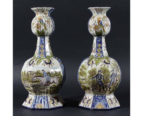 PAIR OF FAIENCE VASES, possibly late 18th century, the garlic style neck above an octagonal baluster body painted with huntin