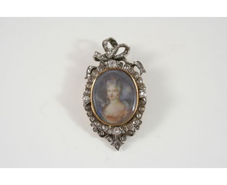 A GEORGIAN DIAMOND AND GOLD PORTRAIT BROOCH centred with a portrait of a lady in fine dress within a border of graduated rose