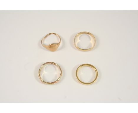 A GOLD AND DIAMOND RING the 18ct. gold band is set with three small diamonds, size L, a 9ct. three colour gold twisted band r